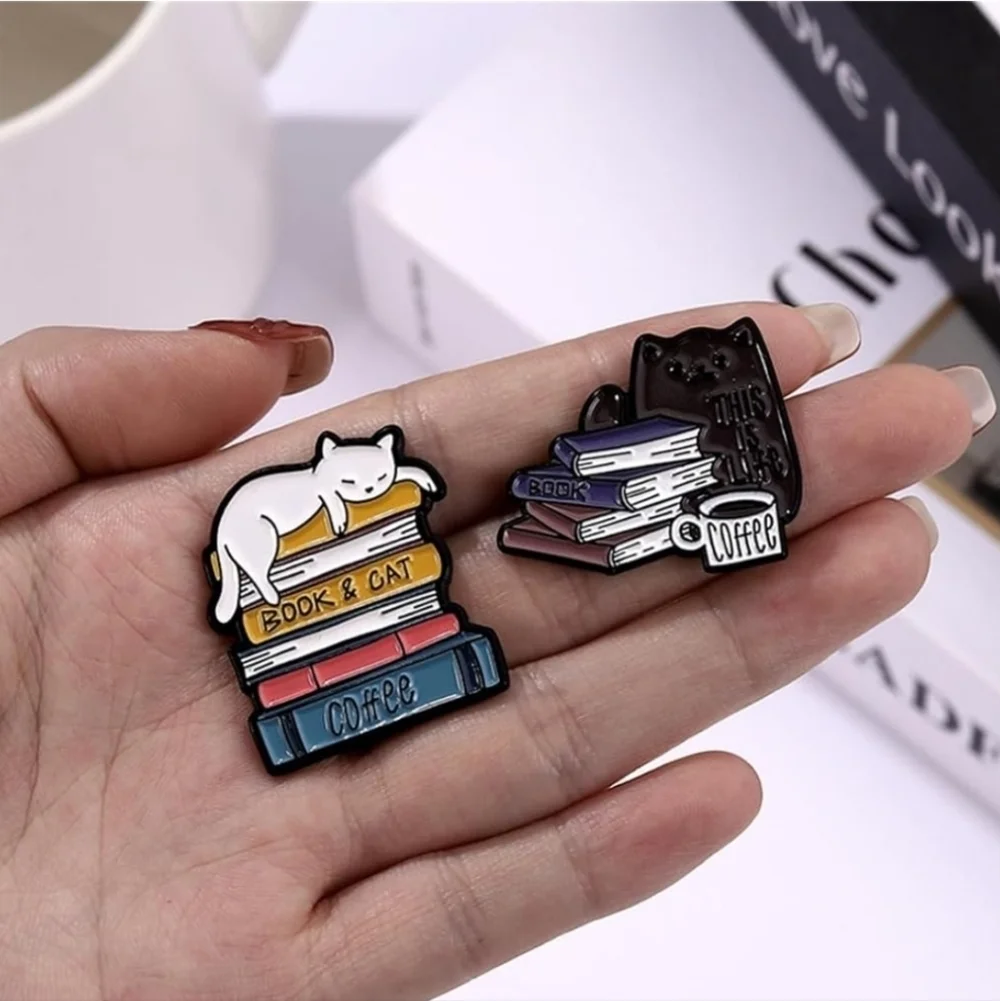Women’s Jewelry Adorable Multicolored Cat Pins and some feature books and cups